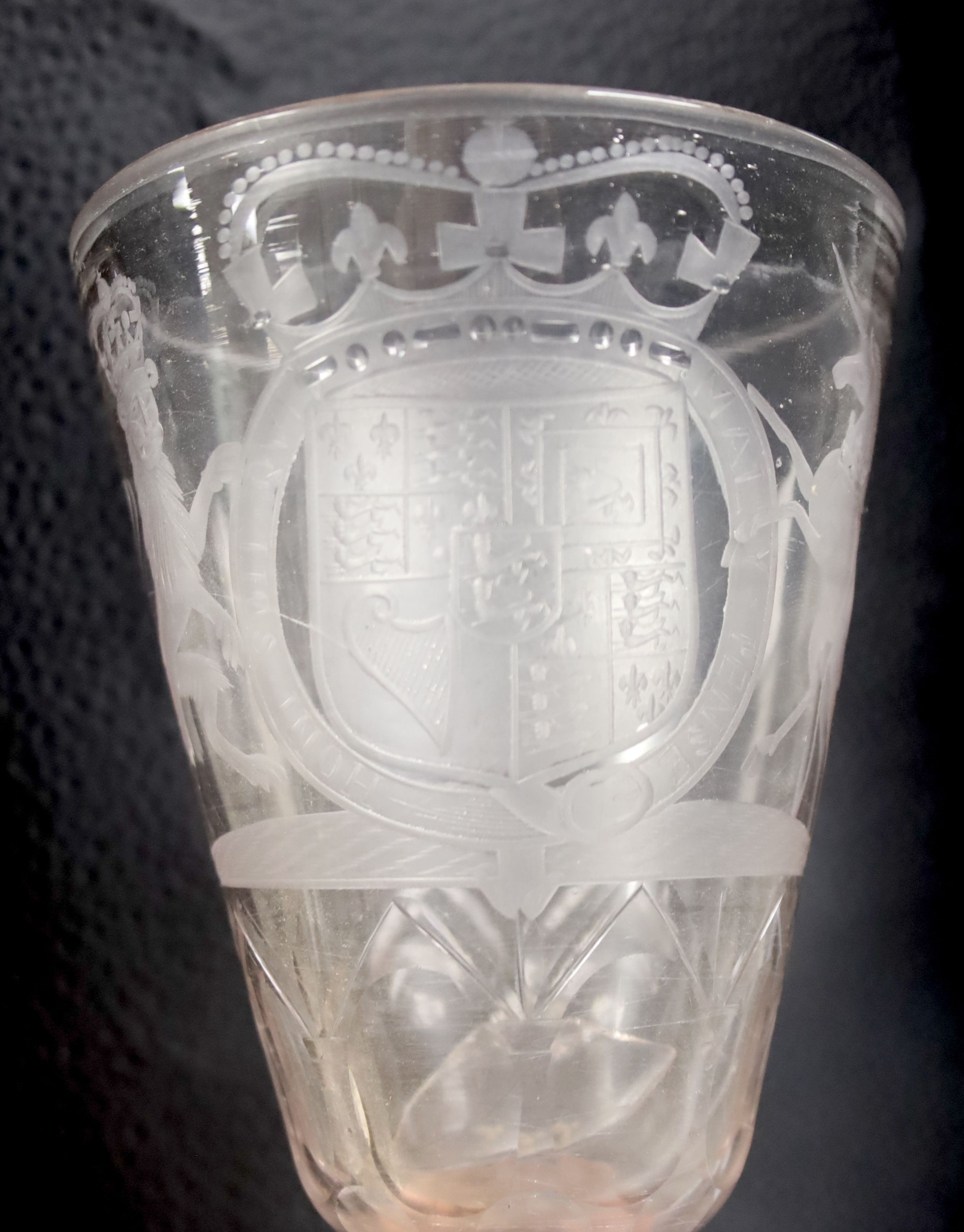 A Bohemian ruby twist engraved armorial goblet and cover, circa 1700, engraved with the Royal Arms, height 25cm, the foot damaged (a.f.)